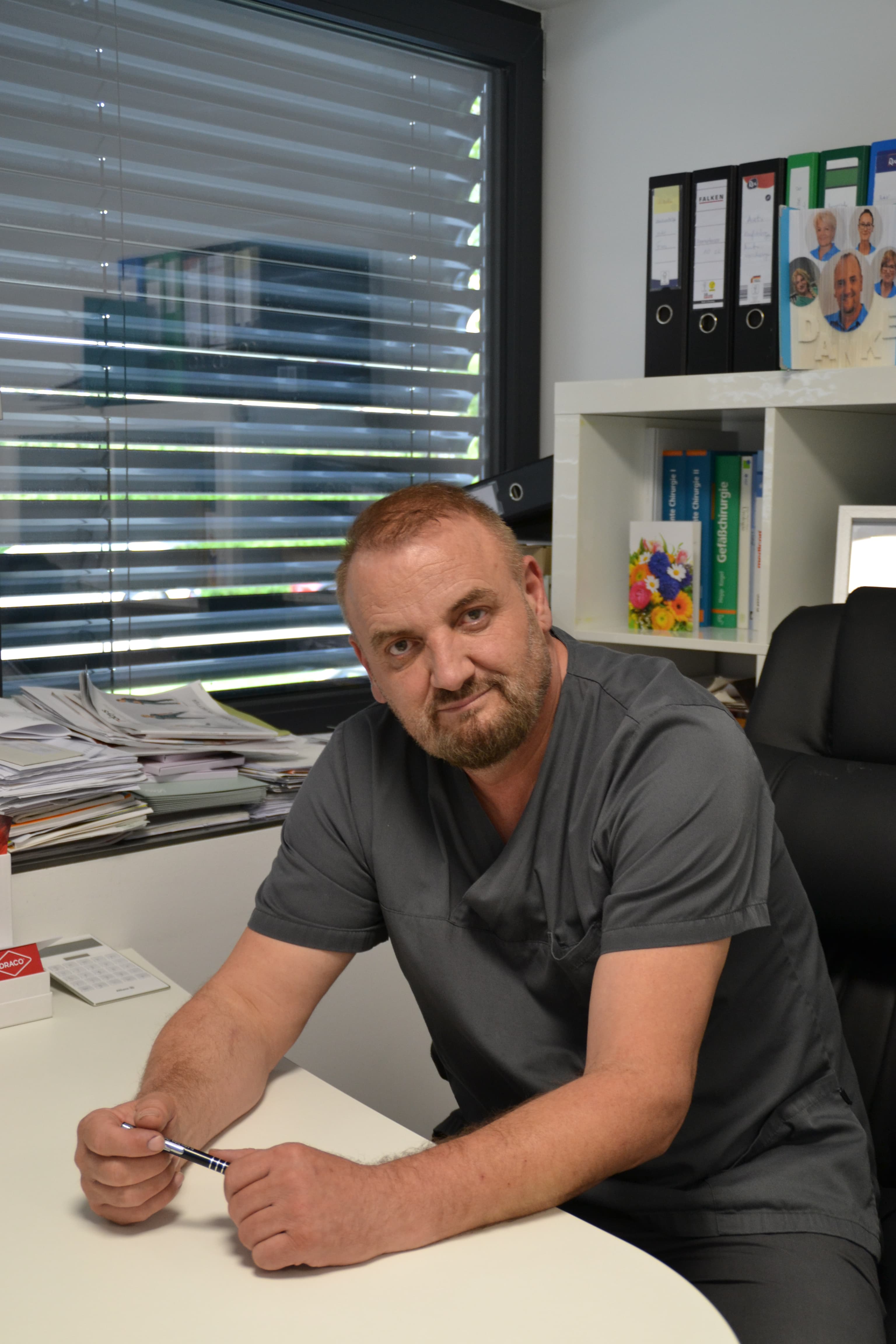 Dr. Adem Dobra